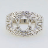 Sterling silver semi mount ring setting with intricate design for oval gemstones, ideal for custom jewelry.